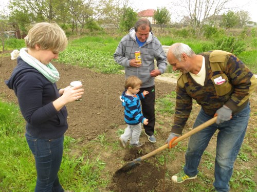 Tavi, Gigi (my father-in-law), Sile (neighbor) and I digging for the Romanian tarantula